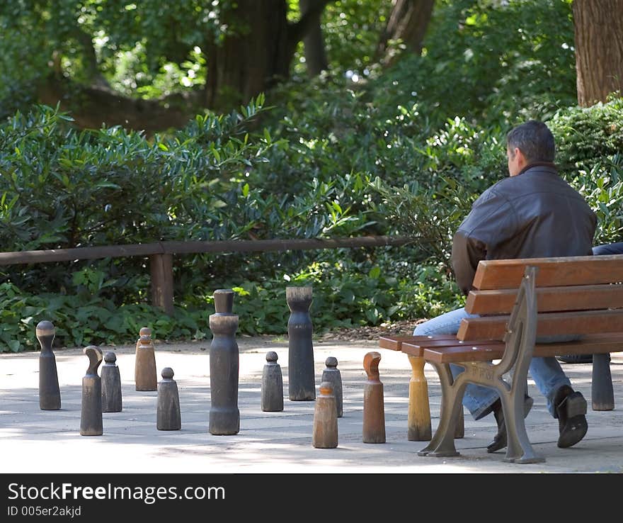 Playing large chess board in park, Frankfurt. Playing large chess board in park, Frankfurt.