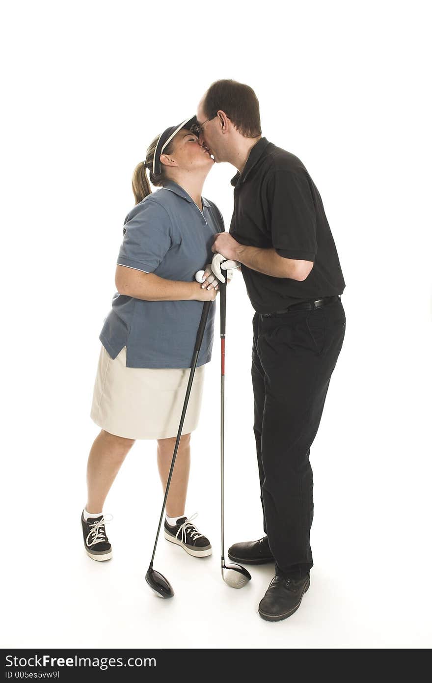 Couple kissing over white