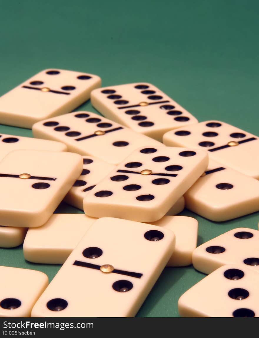 Dominoes on green background. Dominoes on green background