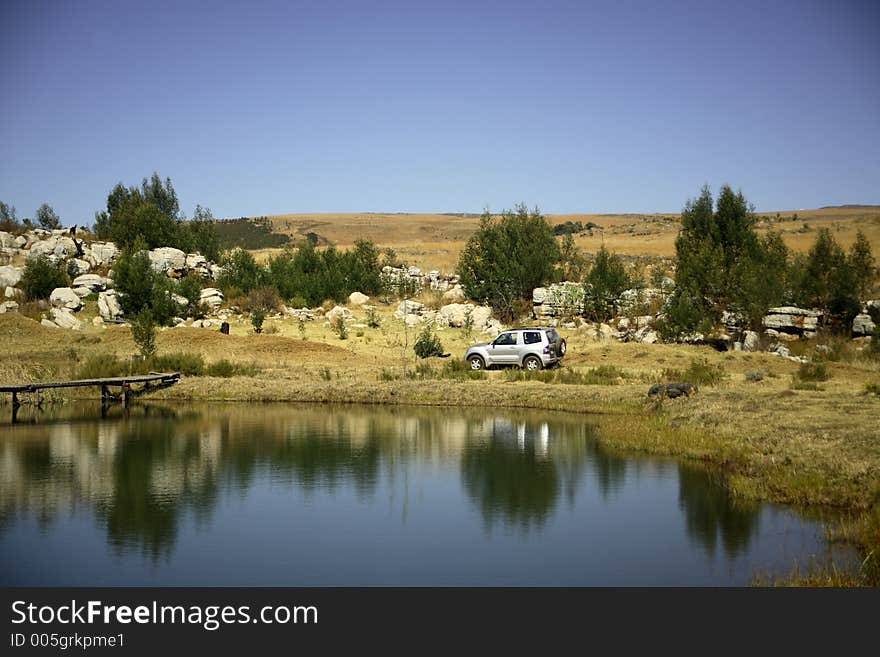 4x4 next to a lake. 4x4 next to a lake