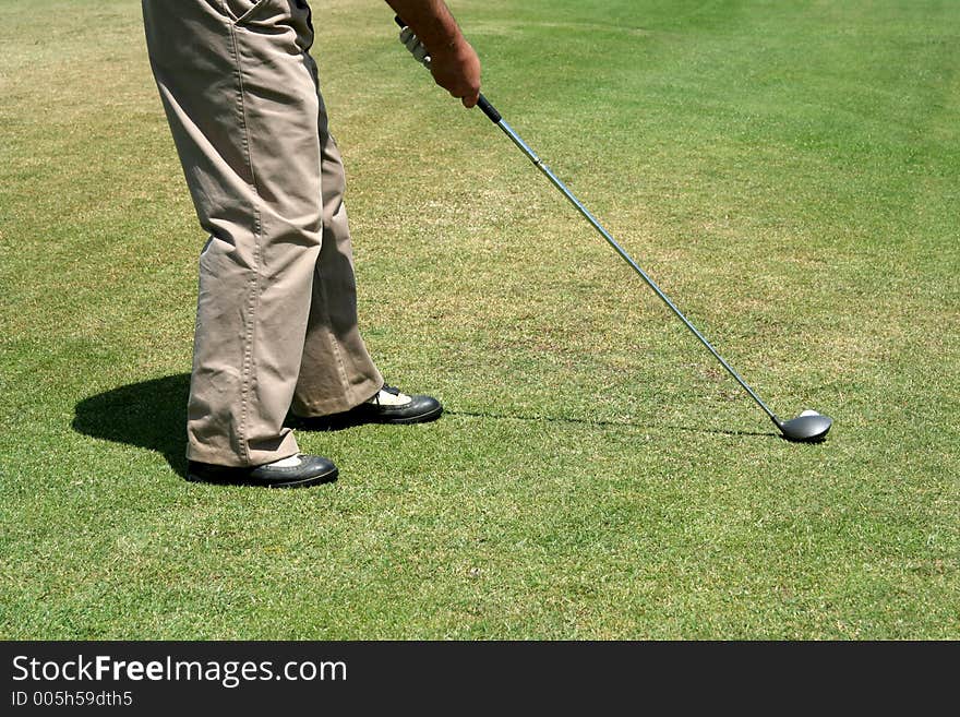 Golfer putting