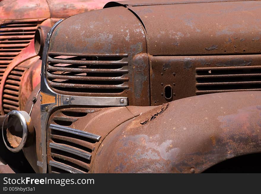 The front end of a couple of wonderful old trucks.