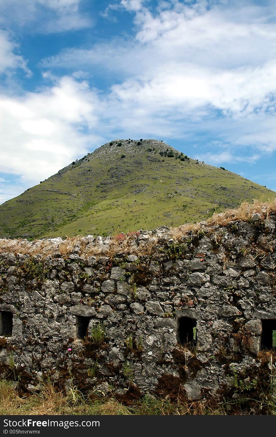 Lesendro ruins at Scadar lake with great clouds and top of mountain. Lesendro ruins at Scadar lake with great clouds and top of mountain