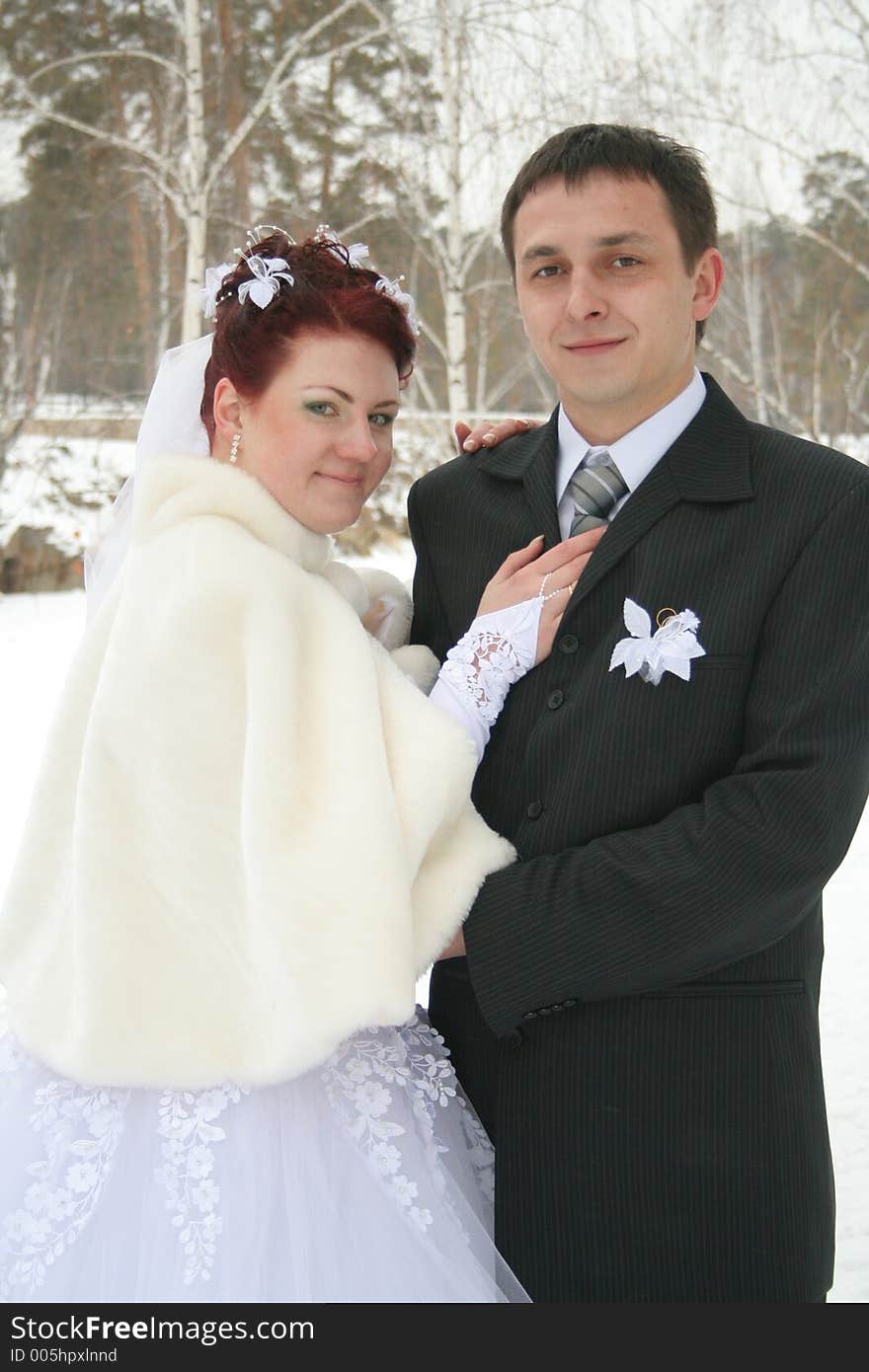 Portrait newlyweds in park. Portrait newlyweds in park