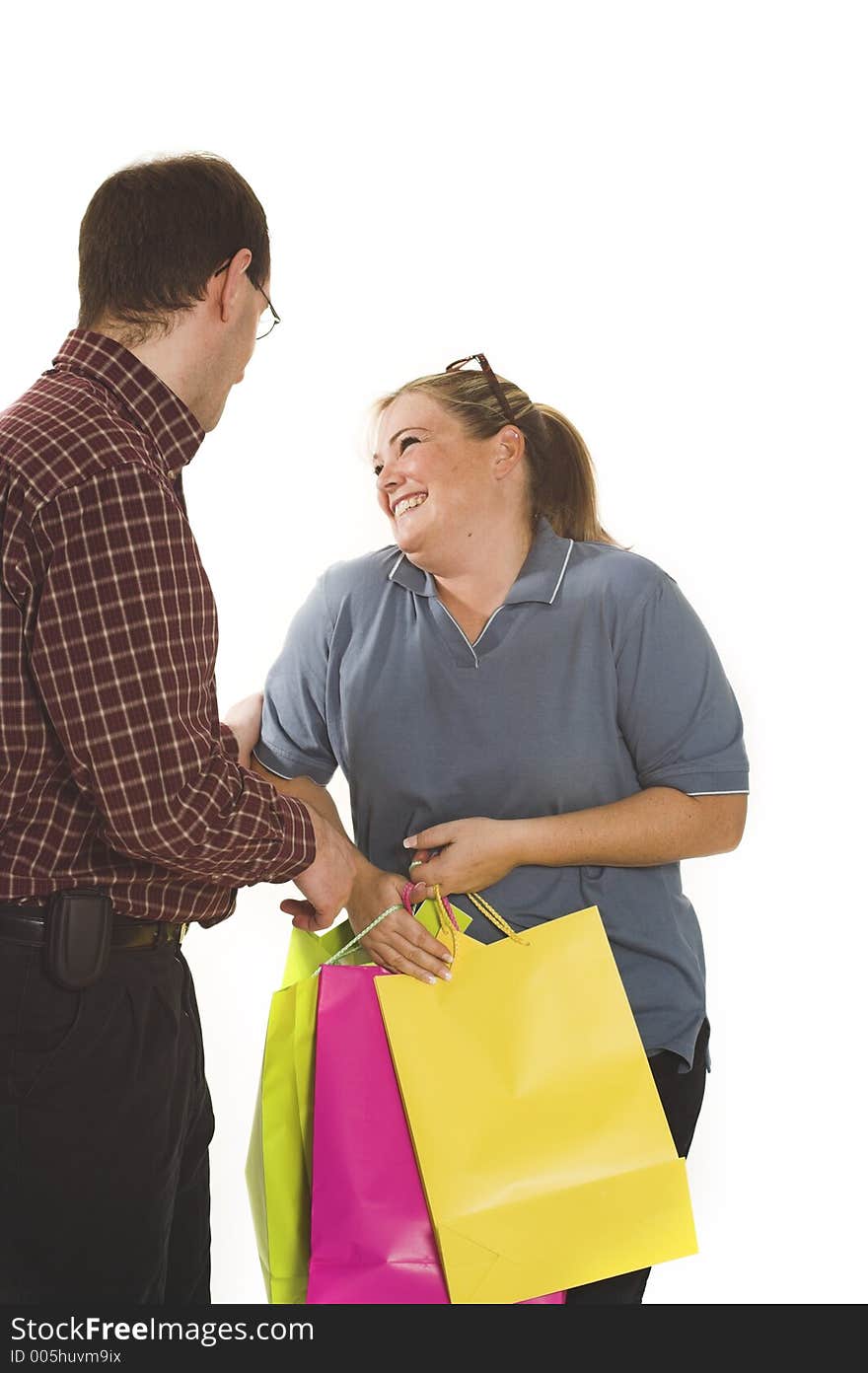 Couple shopping over white background