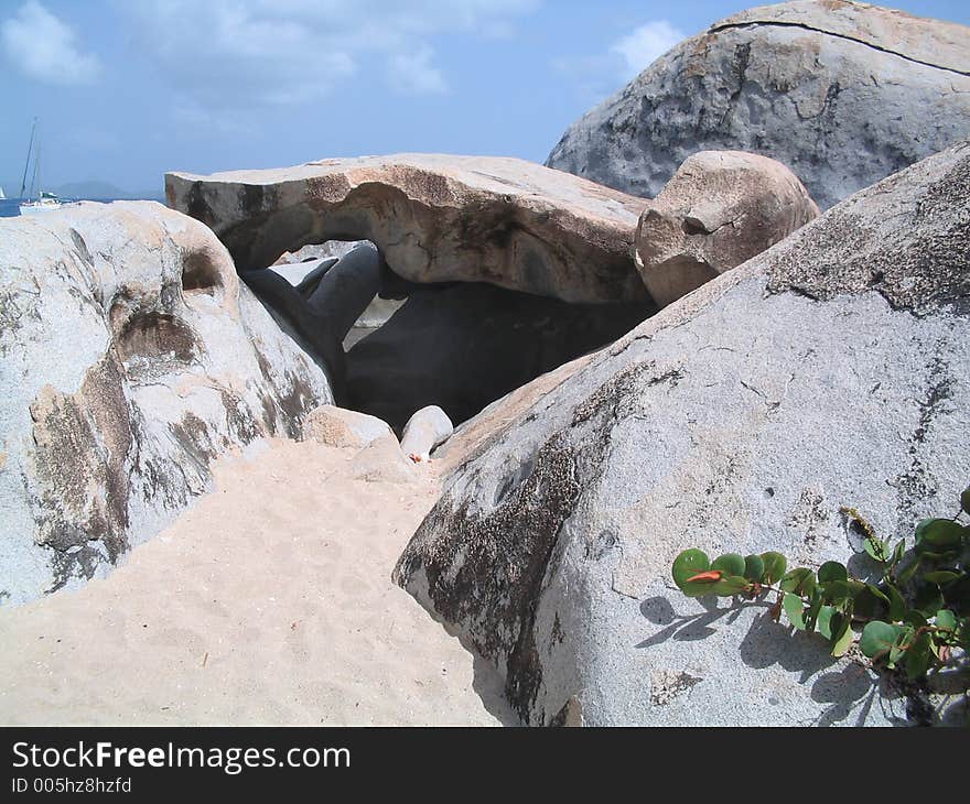 Gigantic granite boulders at The Baths at Virgin Gorda, British Virgin Islands. If you can, please leave a comment about what you are going to use this image for. It'll help me for future uploads. Gigantic granite boulders at The Baths at Virgin Gorda, British Virgin Islands. If you can, please leave a comment about what you are going to use this image for. It'll help me for future uploads.