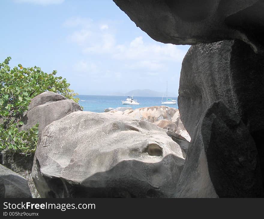 A boat on Devil's Bay peeking over gigantic granite boulders at The Baths at Virgin Gorda, British Virgin Islands.

If you can, please leave a comment about what you are going to use this image for. It'll help me for future uploads. A boat on Devil's Bay peeking over gigantic granite boulders at The Baths at Virgin Gorda, British Virgin Islands.

If you can, please leave a comment about what you are going to use this image for. It'll help me for future uploads.