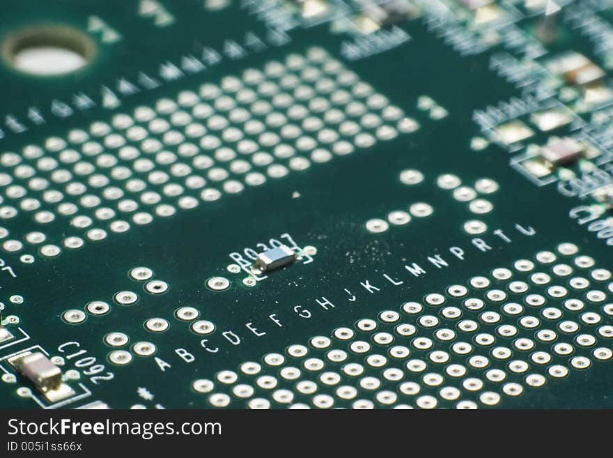 Motherboard contacts with alphabet markings in macro. Motherboard contacts with alphabet markings in macro