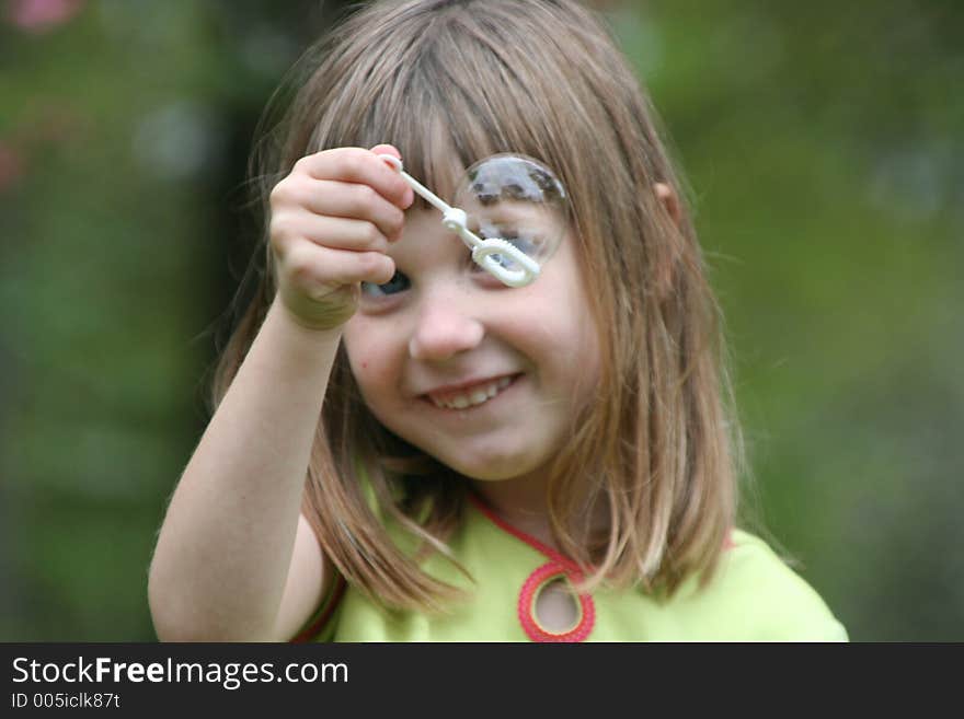 Girl with bubbleon wand. Girl with bubbleon wand