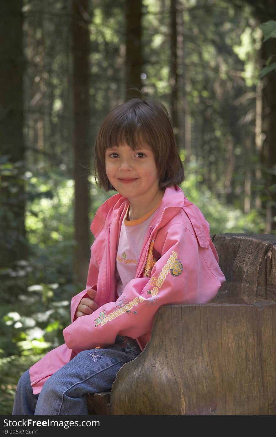 Girl Sitting On A Tree Stump 03