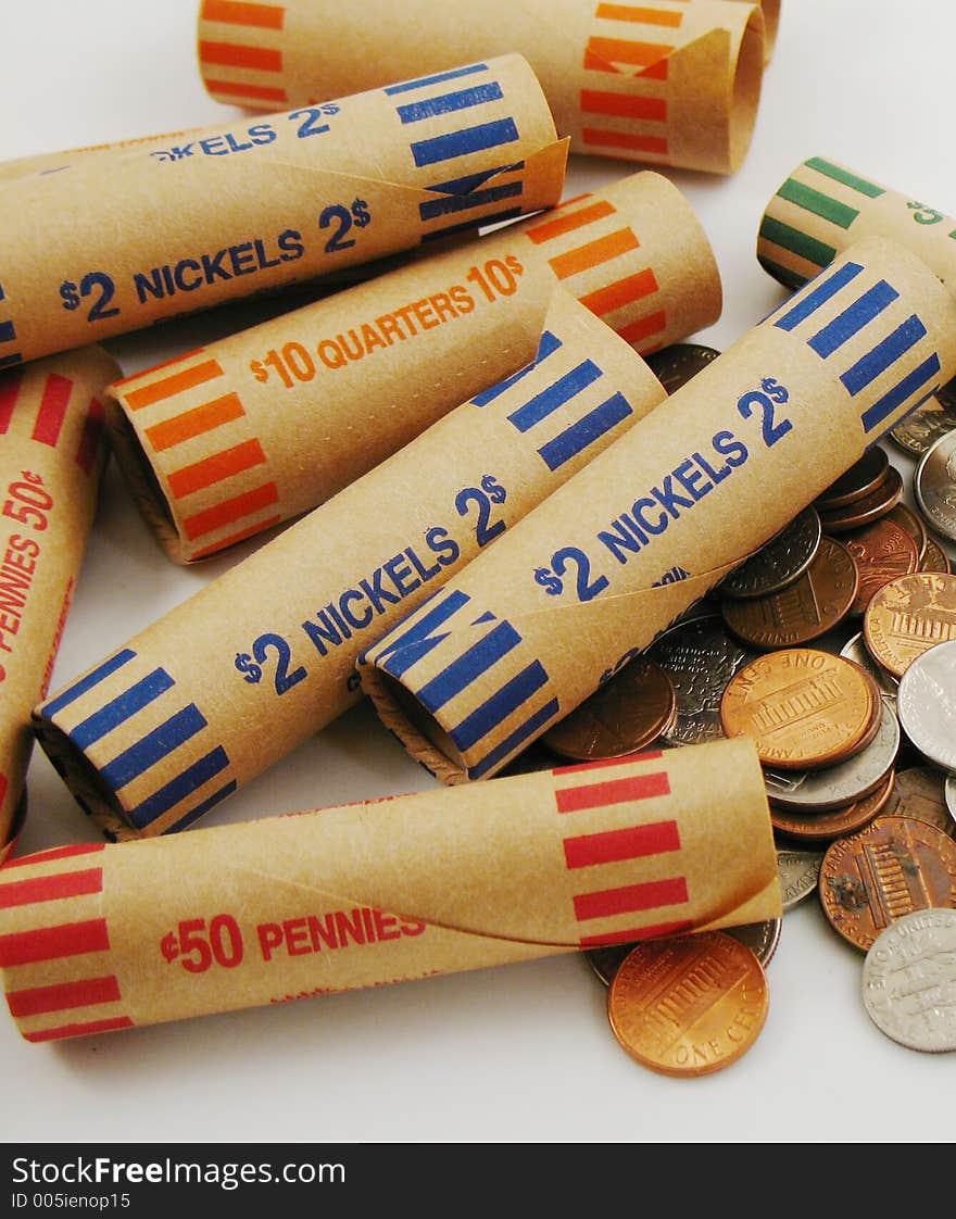 Coins and paper coin wrappers