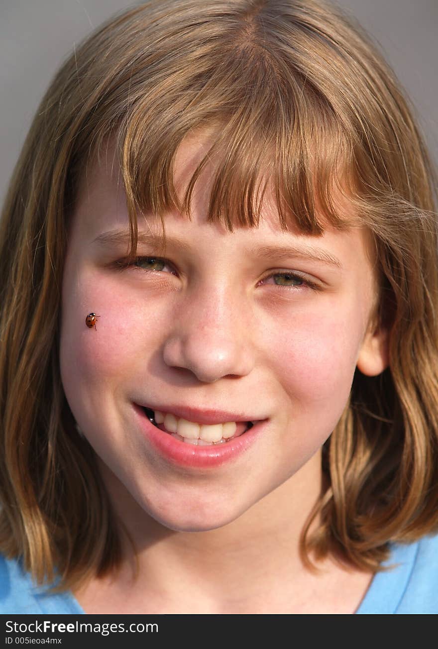 Cute Girl with a lady bug on her cheek.  Fine detail.  Can be used with back to school ads.  I love this girl with all of my heart. She was taken away by her mom when we split up and I was her step-dad so I have no rights.  She is an angel in my memories. Cute Girl with a lady bug on her cheek.  Fine detail.  Can be used with back to school ads.  I love this girl with all of my heart. She was taken away by her mom when we split up and I was her step-dad so I have no rights.  She is an angel in my memories.