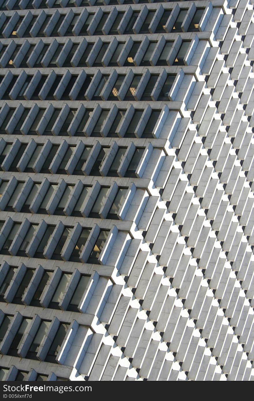 Great window pattern on a corporate downtown building. Great window pattern on a corporate downtown building.