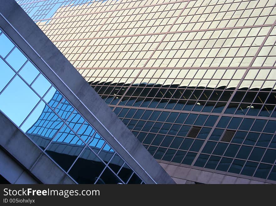 Wonderful patterns, colors and reflections on two buildings. Wonderful patterns, colors and reflections on two buildings.