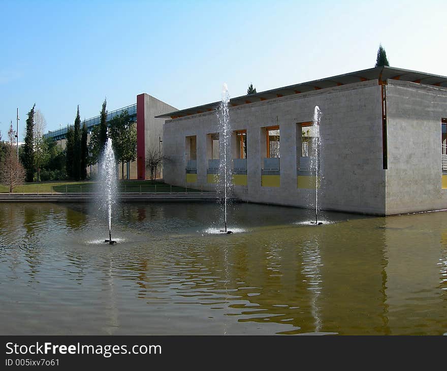 Three water spurts in an artificial lake