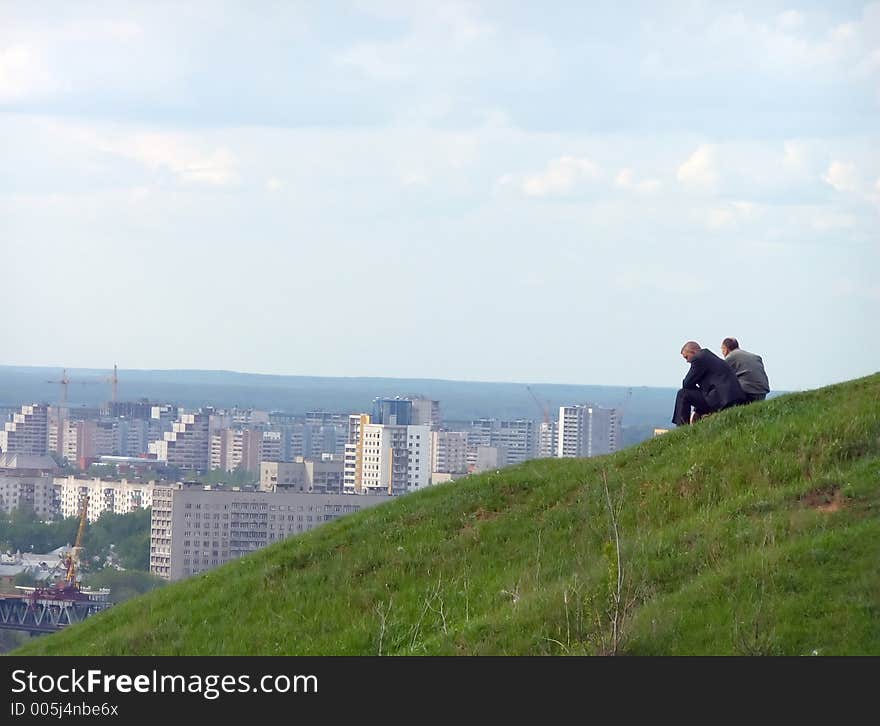 People look at building city. People look at building city