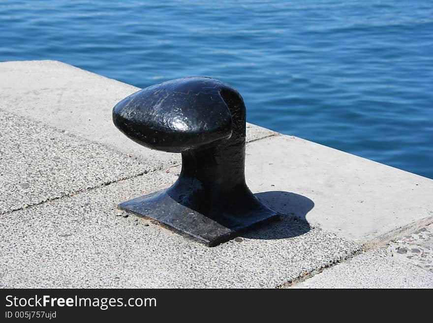 Mooring point and sea. Mooring point and sea