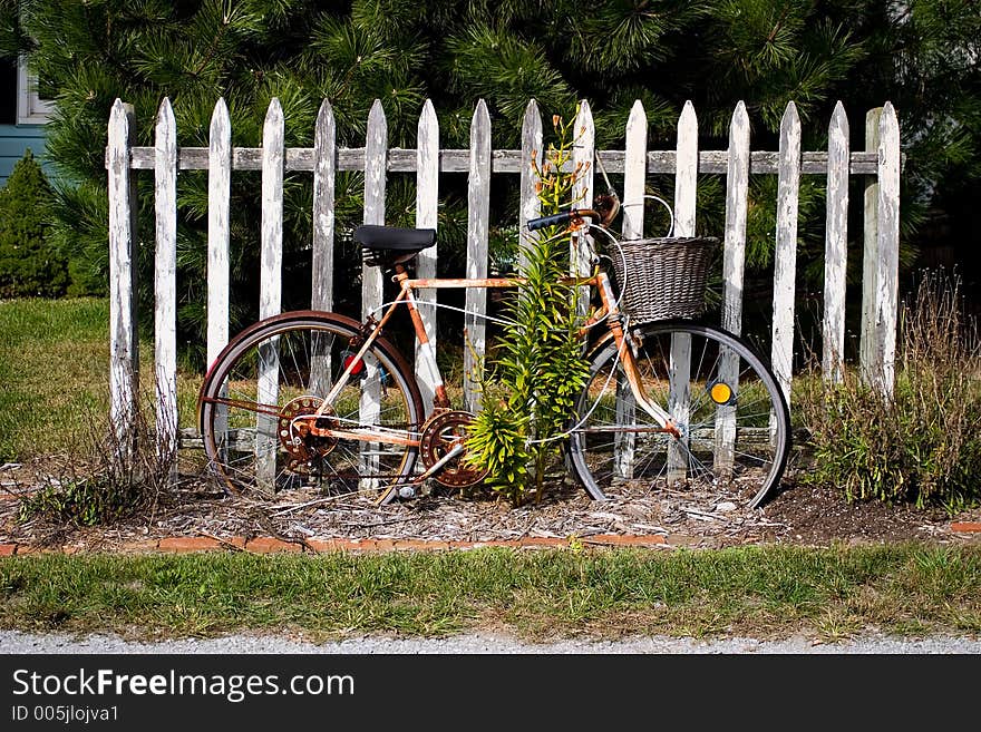 Vintage Bicycle by Fence