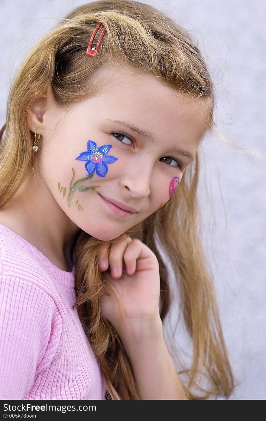 Pretty girl with flower butterfly make-up