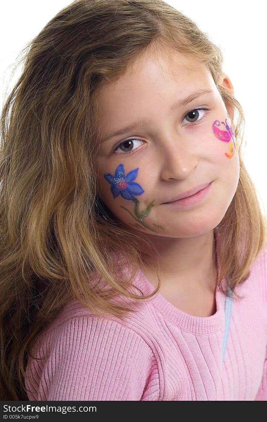 Beautiful young girl with a flower and butterfl drawing on her cheek. Beautiful young girl with a flower and butterfl drawing on her cheek