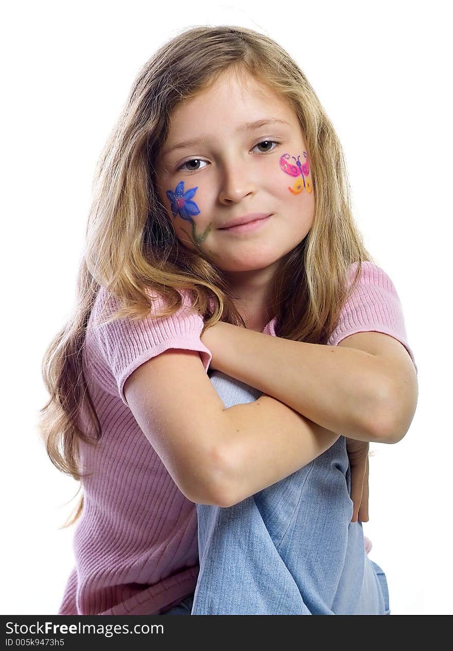 Beautiful young girl with a flower and butterfl drawing on her cheek. Beautiful young girl with a flower and butterfl drawing on her cheek