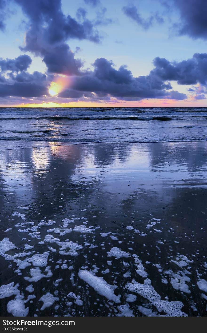 Sunset on a beach in the netherlands with blue colors. Sunset on a beach in the netherlands with blue colors