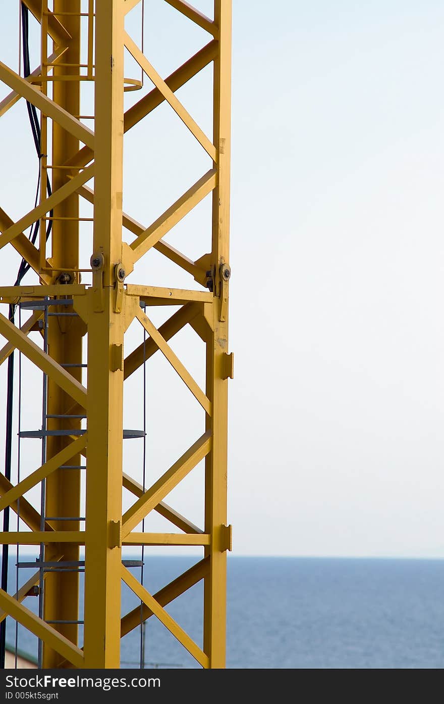 A crane standing against the sea, Viareggio, Italy