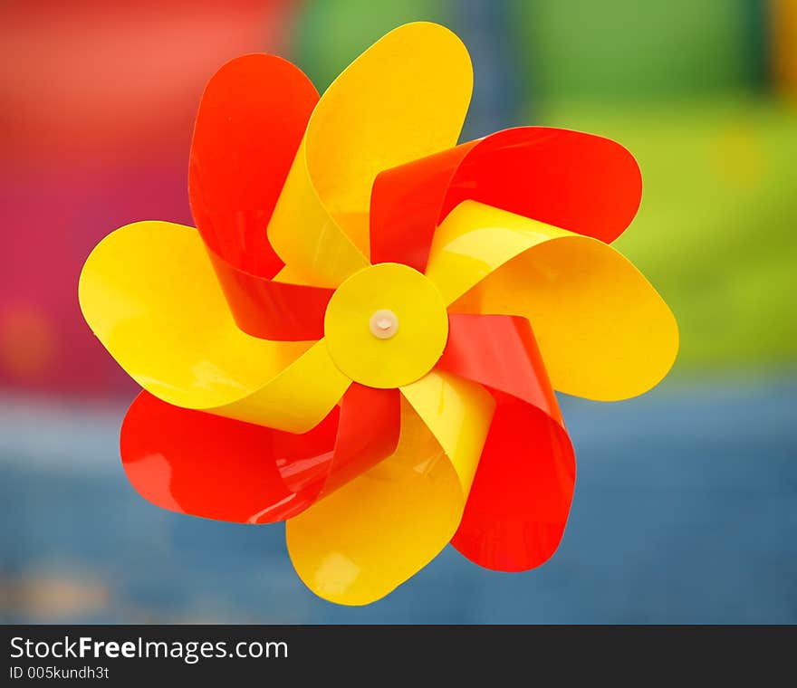 Multicolor pinwheel on multicolor background