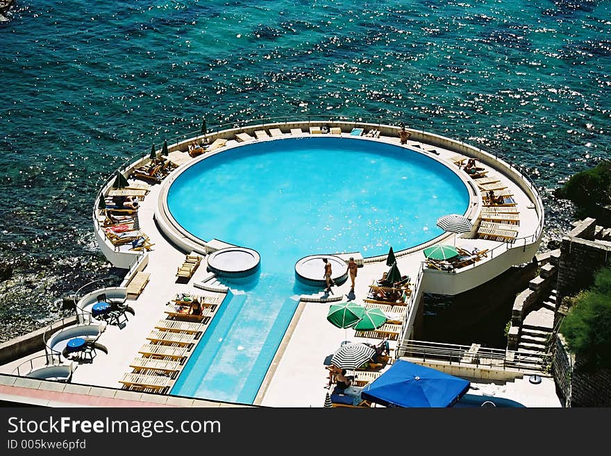 Hotel's swiming pool by the sea