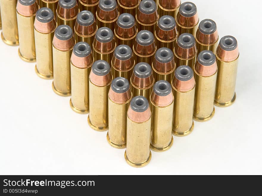 Rows of .38 Special ammo. Isolated. Rows of .38 Special ammo. Isolated