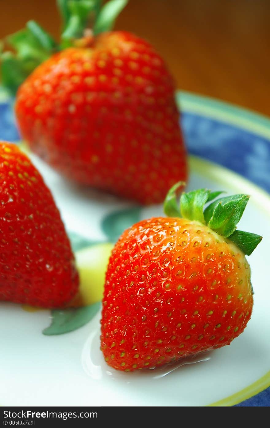 Fresh strawberries on plate