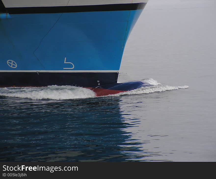 The bulbous bow on a ferry as it approaches port. Also shows the sign for bulbous bow and thruster. The bulbous bow on a ferry as it approaches port. Also shows the sign for bulbous bow and thruster.