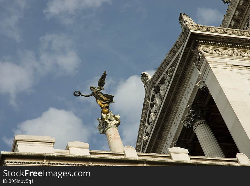 Bronze statue of a symbolic peace's angel over Victor Emmanuel II monument. also called Altare della Patria, fatherland's altar, a mausoleum, a tomb of an unknown soldier. Bronze statue of a symbolic peace's angel over Victor Emmanuel II monument. also called Altare della Patria, fatherland's altar, a mausoleum, a tomb of an unknown soldier.