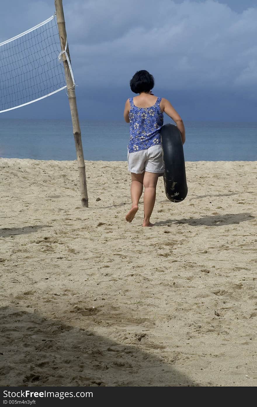 Lone woman on beach