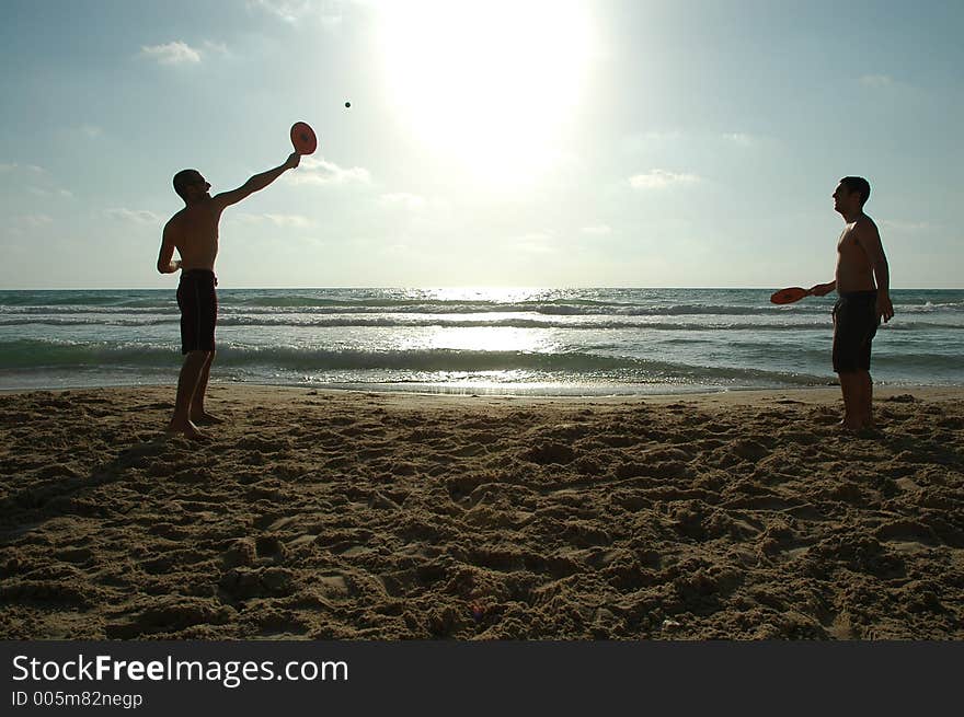 Playing bats at the coast. Playing bats at the coast