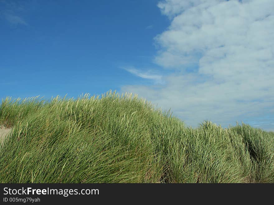 Sand dunes, blue sky