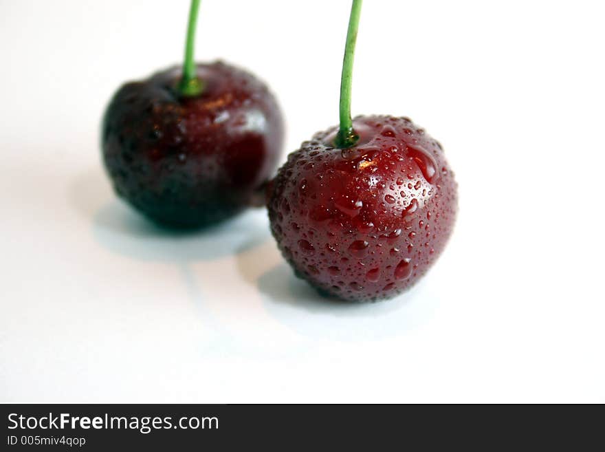 Two cherries in isolated