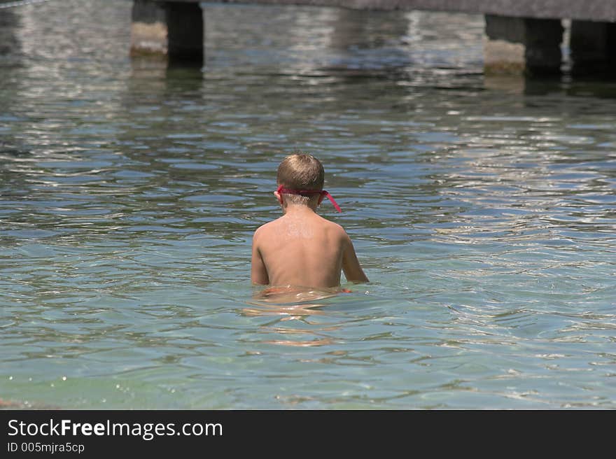 Children swimming & playing at local lake in Florida. Children swimming & playing at local lake in Florida