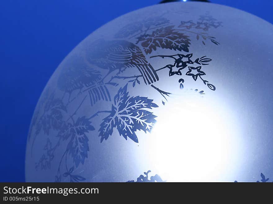 Detail of a lamp with blue background. Detail of a lamp with blue background