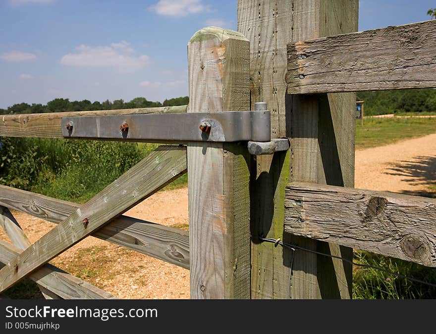 Hinge on wooden farm gate. Hinge on wooden farm gate