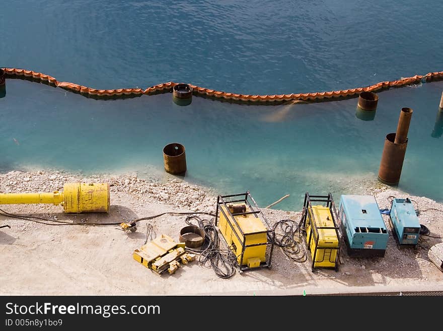 Work tools near lake in turquoise blue colour