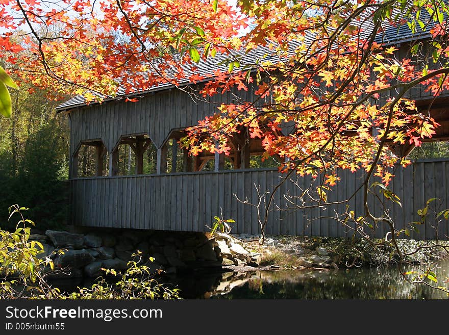 Covered bridge with fall colors. Covered bridge with fall colors