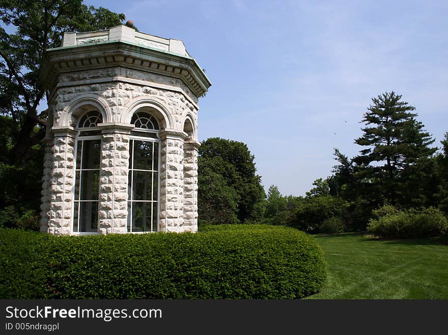 Stone monument in a green lawn. Stone monument in a green lawn