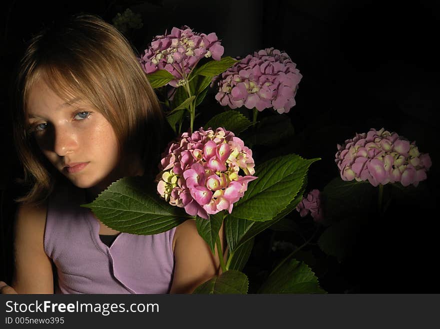 Girl in Flowers Dark Background