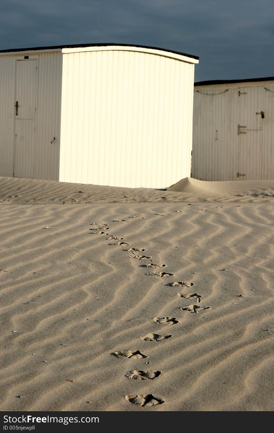 Summer in denmark:beach houses, birds foot steps in the sand. Summer in denmark:beach houses, birds foot steps in the sand