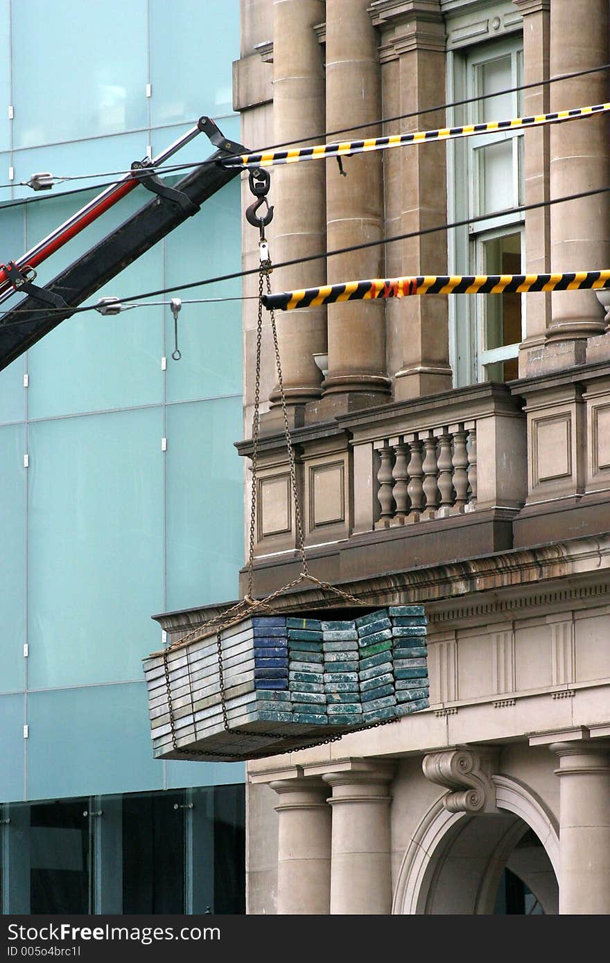 Crane With City Buildings