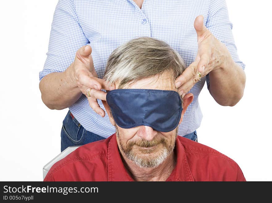 Lady giving her husband a head massage