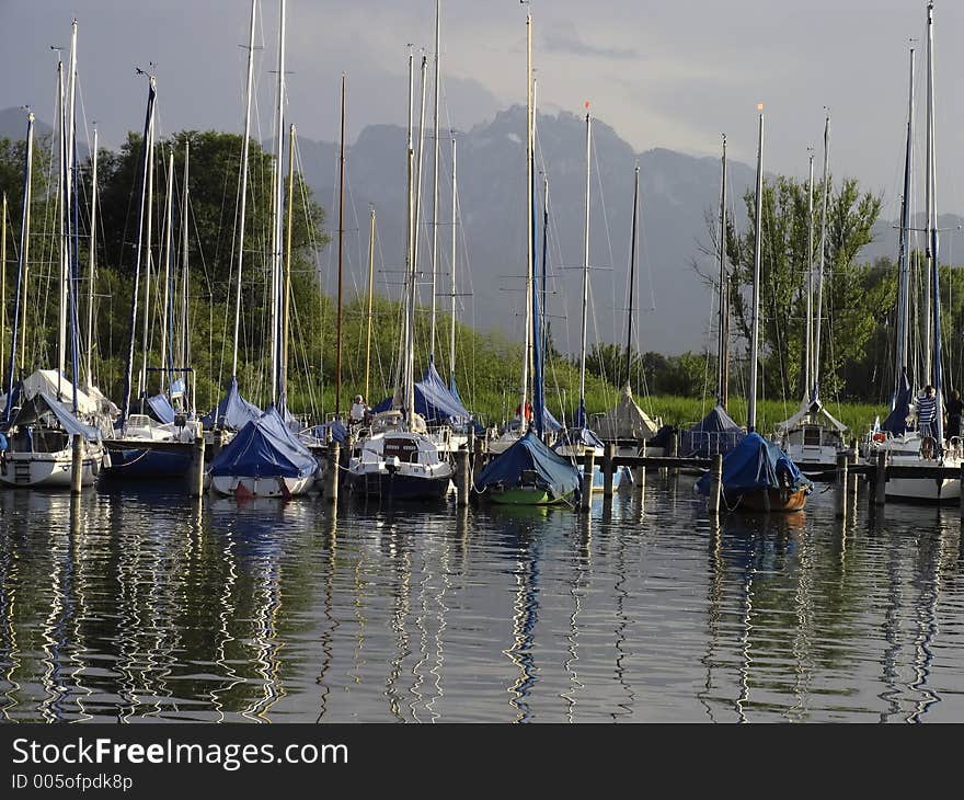 View on the Chiemsee, Bavaria, walking down post meridiem. The Alps to be seen in the background. View on the Chiemsee, Bavaria, walking down post meridiem. The Alps to be seen in the background.