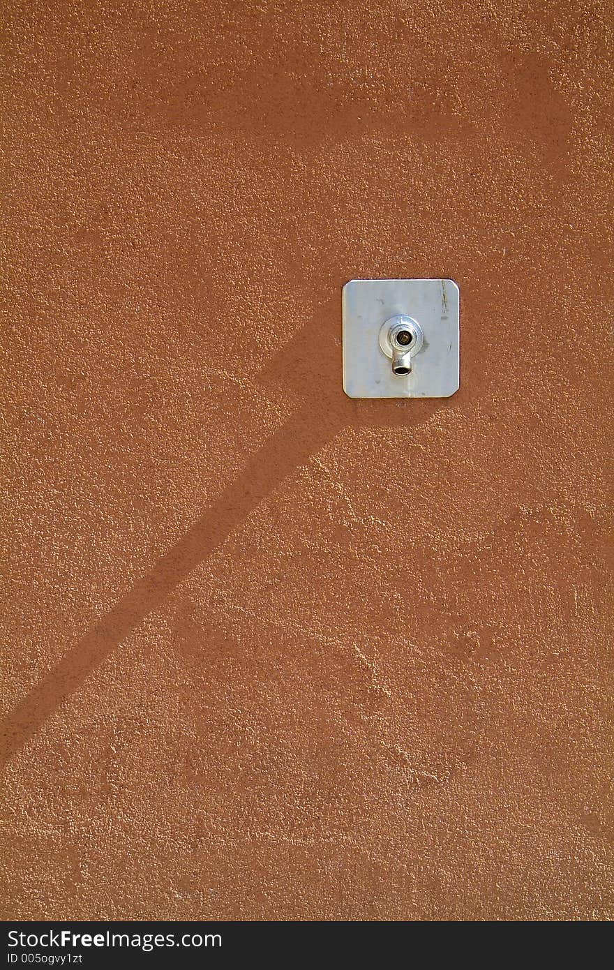 Water Tap On A Concrete Wall