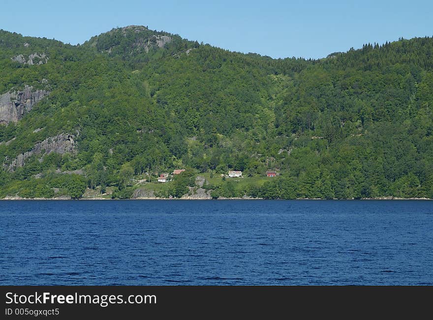 Small farm by the fjord